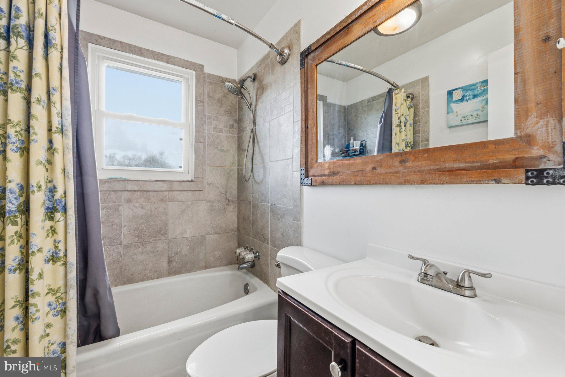2092 Rocksprings Road Ringgold, VA 24586 - Photo 36 of 84 a bathroom with a sink and a bathtub