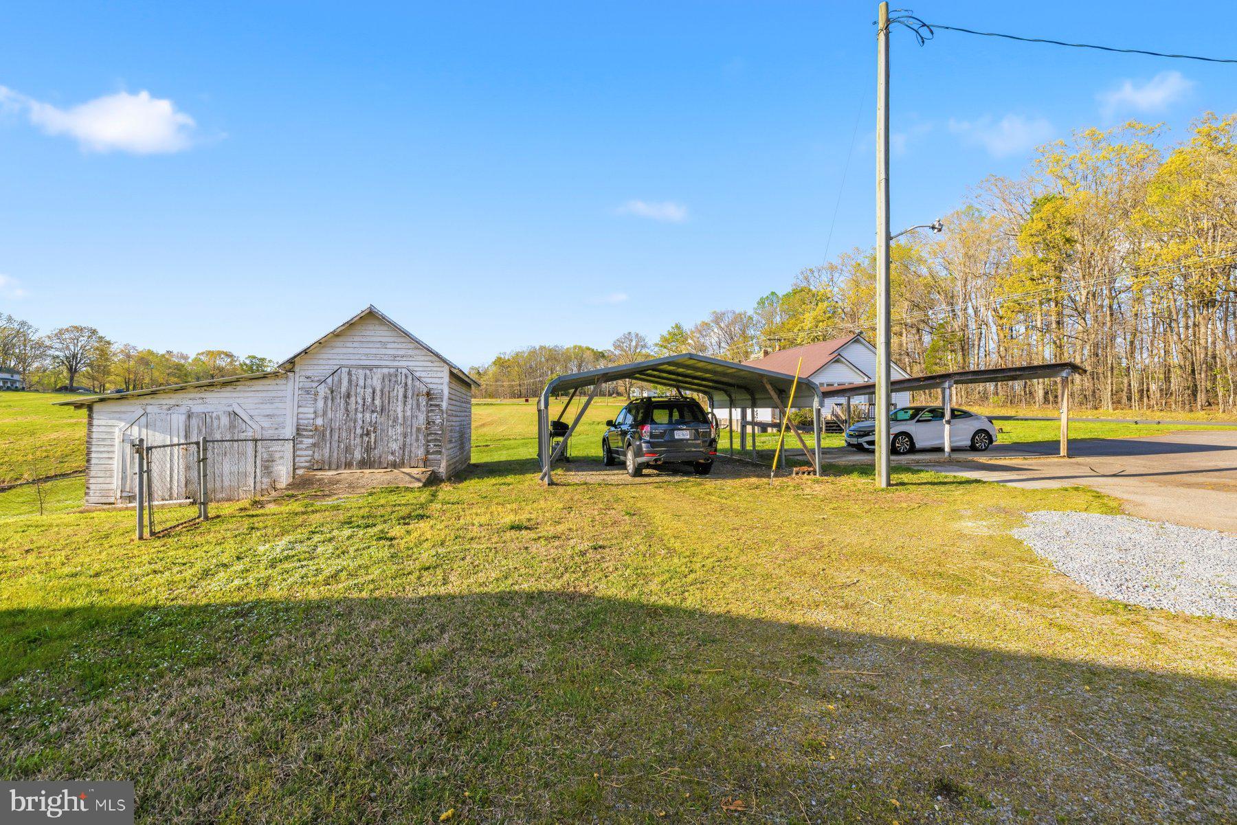 2092 Rocksprings Road Ringgold, VA 24586 - Photo 41 of 84 a view of swimming pool with lawn chairs and wooden fence