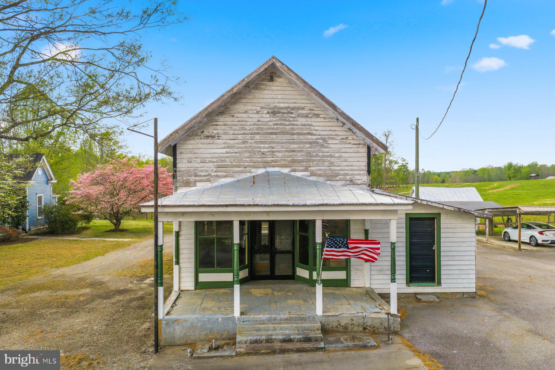 2092 Rocksprings Road Ringgold, VA 24586 - Photo 45 of 84 a view of a house with a porch and furniture