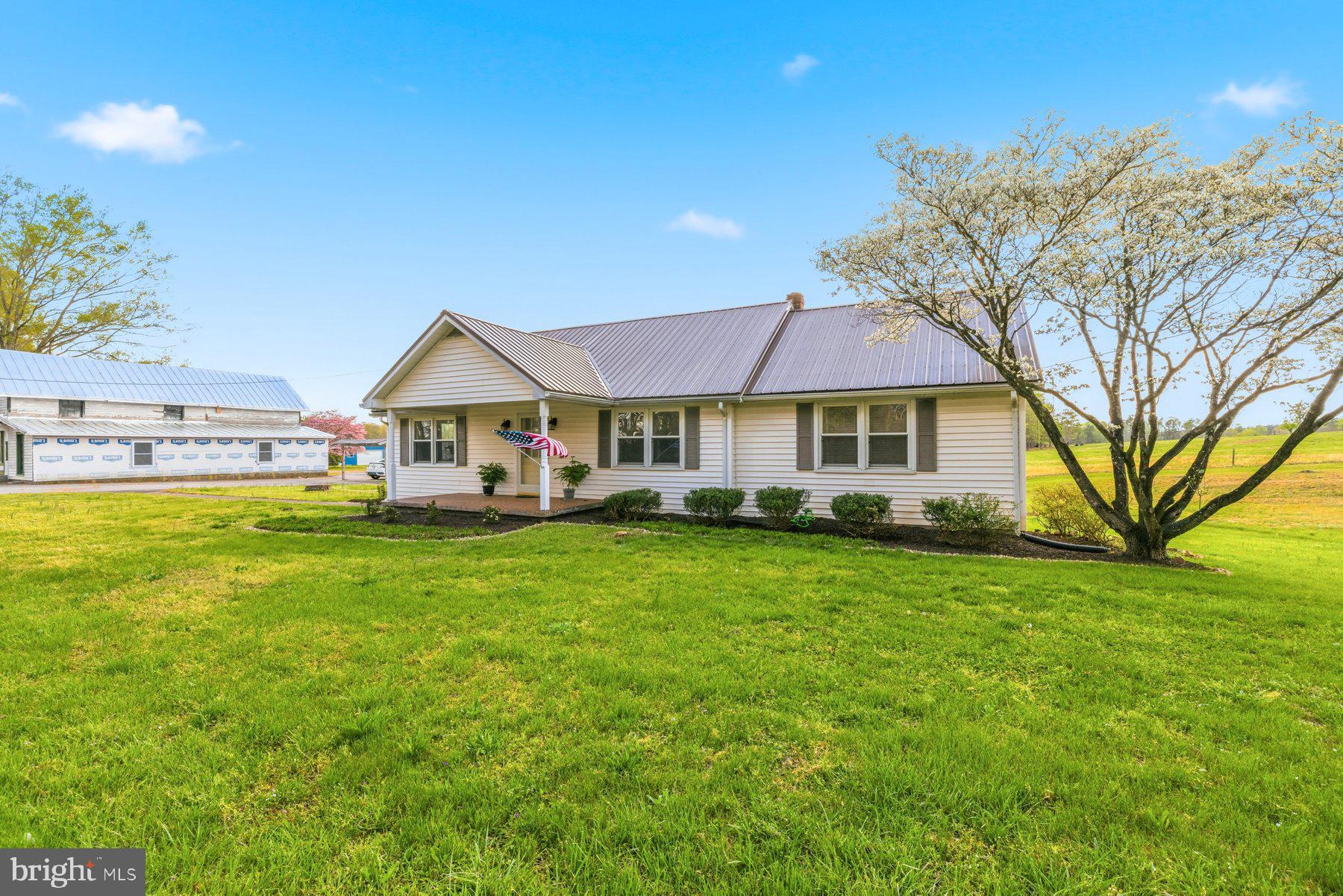 2092 Rocksprings Road Ringgold, VA 24586 - Photo 5 of 84 a front view of a house with garden