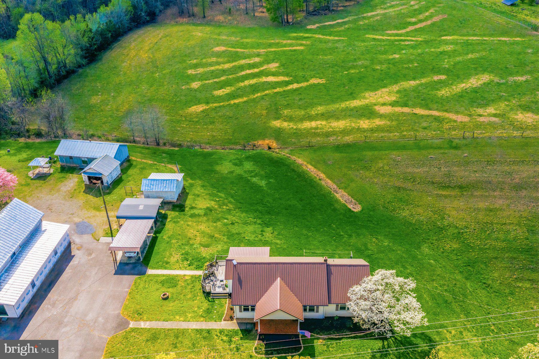 2092 Rocksprings Road Ringgold, VA 24586 - Photo 72 of 84 an aerial view of a house with a garden