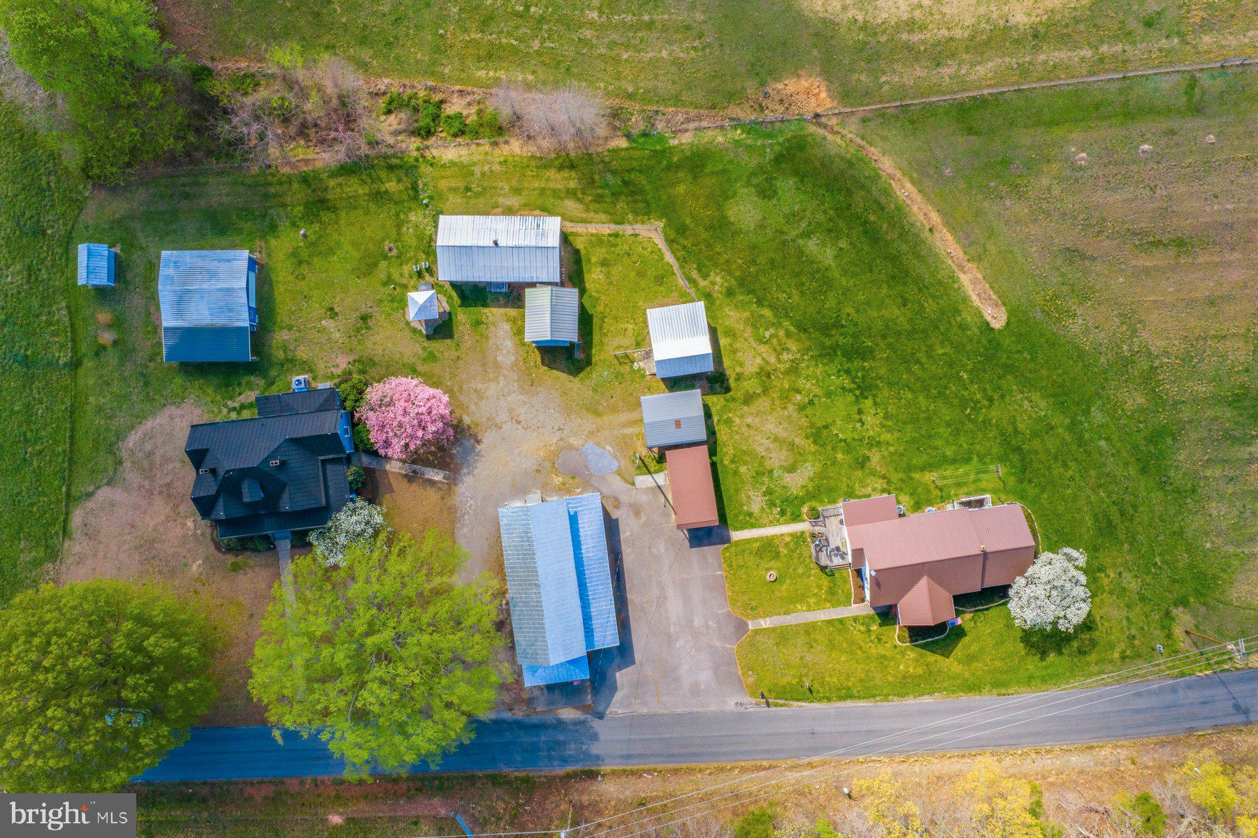 2092 Rocksprings Road Ringgold, VA 24586 - Photo 78 of 84 an aerial view of a house with a garden and lake view