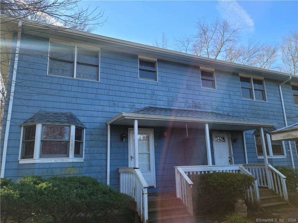93 Clintonville Road, Unit 9 North Branford, CT 06472 - Photo 1 of 1 a front view of a house