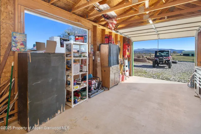 a view of a bike storage storage and utility room