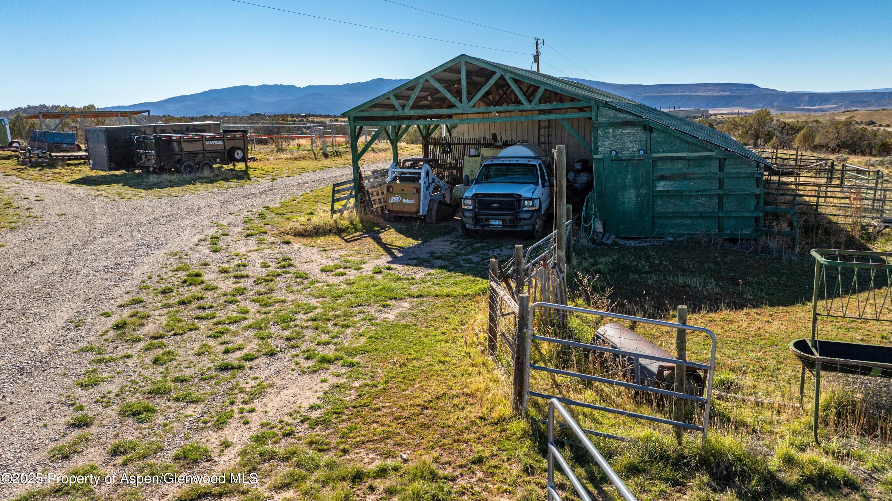 260 Lazy S Reverse Drive Silt, CO 81652 - Photo 9 of 30 a view of a house with wooden fence