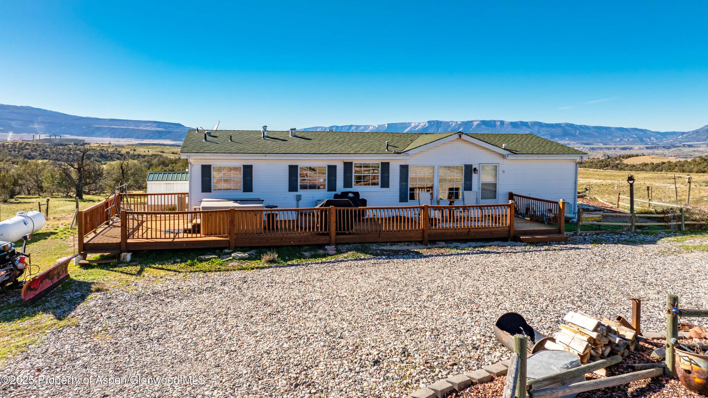 260 Lazy S Reverse Drive Silt, CO 81652 - Photo 10 of 30 a front view of a house with a garden view