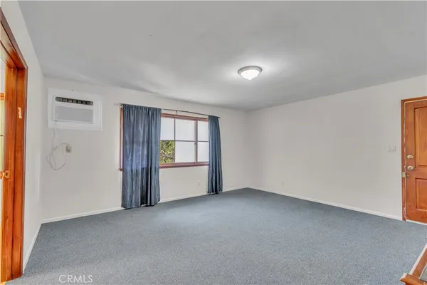 a view of a playground with basketball court