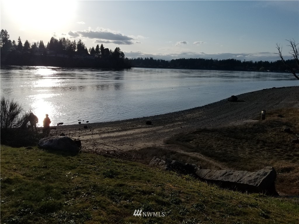 0 Tracyton Beach Road Northwest Bremerton, WA 98310 - Photo 3 of 6 a view of a lake from a yard