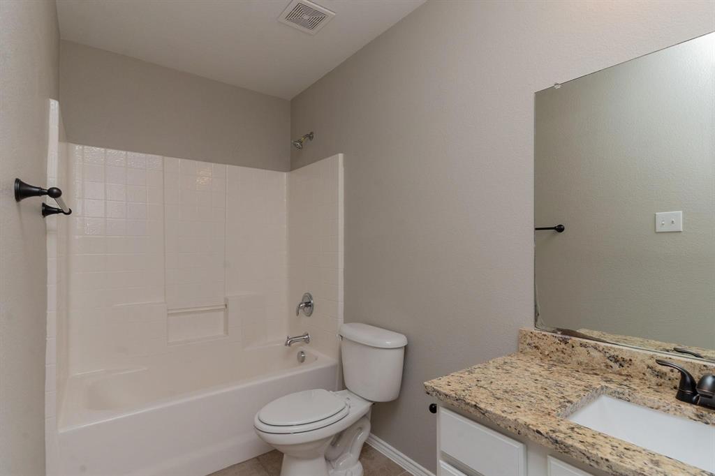 4313 Summer Star Lane Fort Worth, TX 76244 - Photo 23 of 26 Bathroom with vanity and shower / bath combination