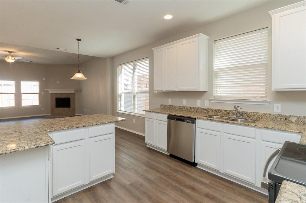 4313 Summer Star Lane Fort Worth, TX 76244 - Photo 6 of 26 Kitchen featuring dishwasher, electric range oven, a ceiling fan, white cabinetry, and dark wood-style flooring