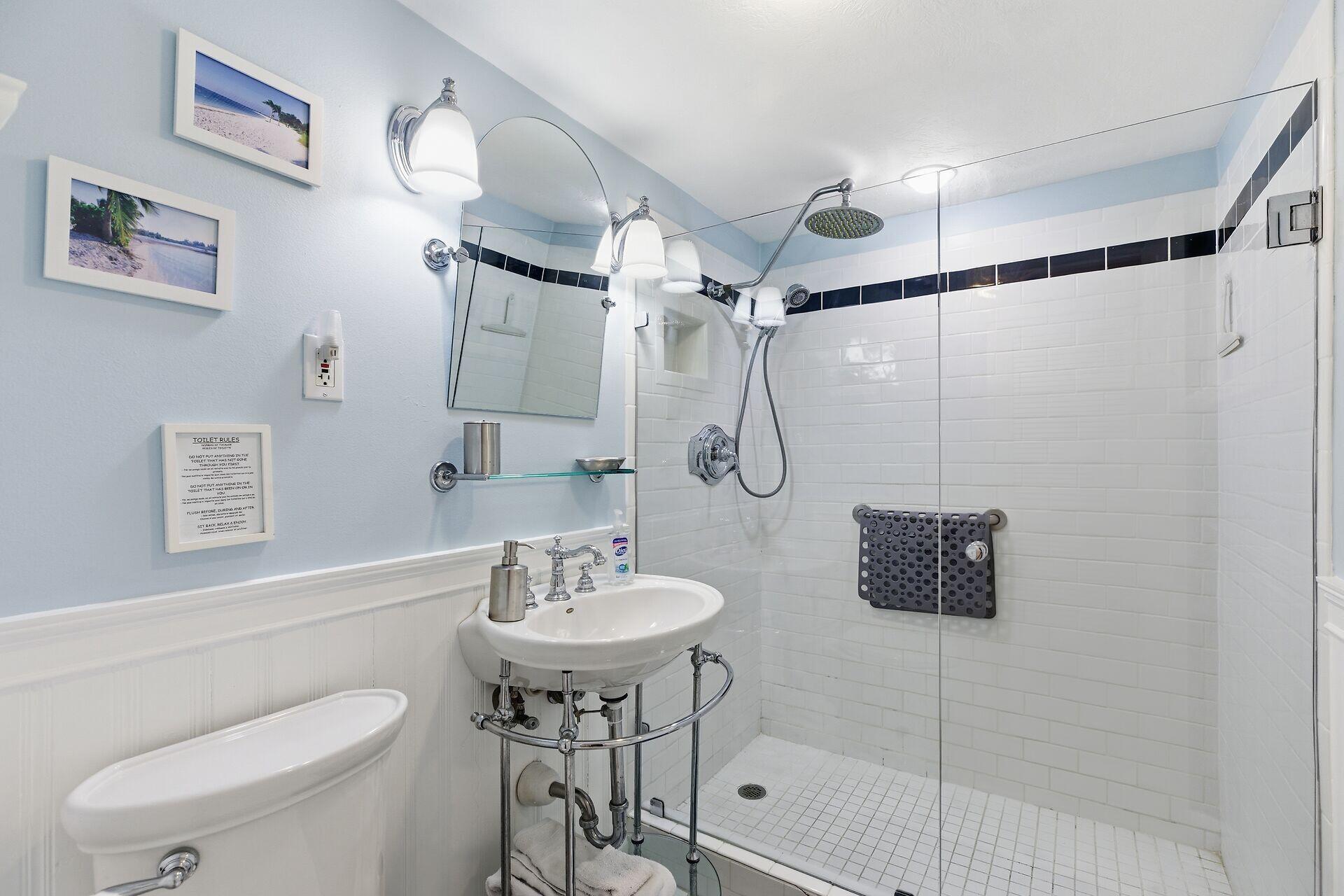 26 7th Street Key Colony Beach, FL 33051 - Photo 22 of 37 a bathroom with a sink toilet and shower