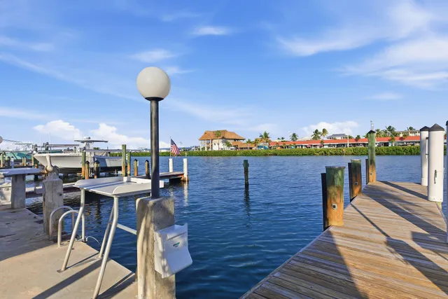 a view of a chairs and table on the wooden floor