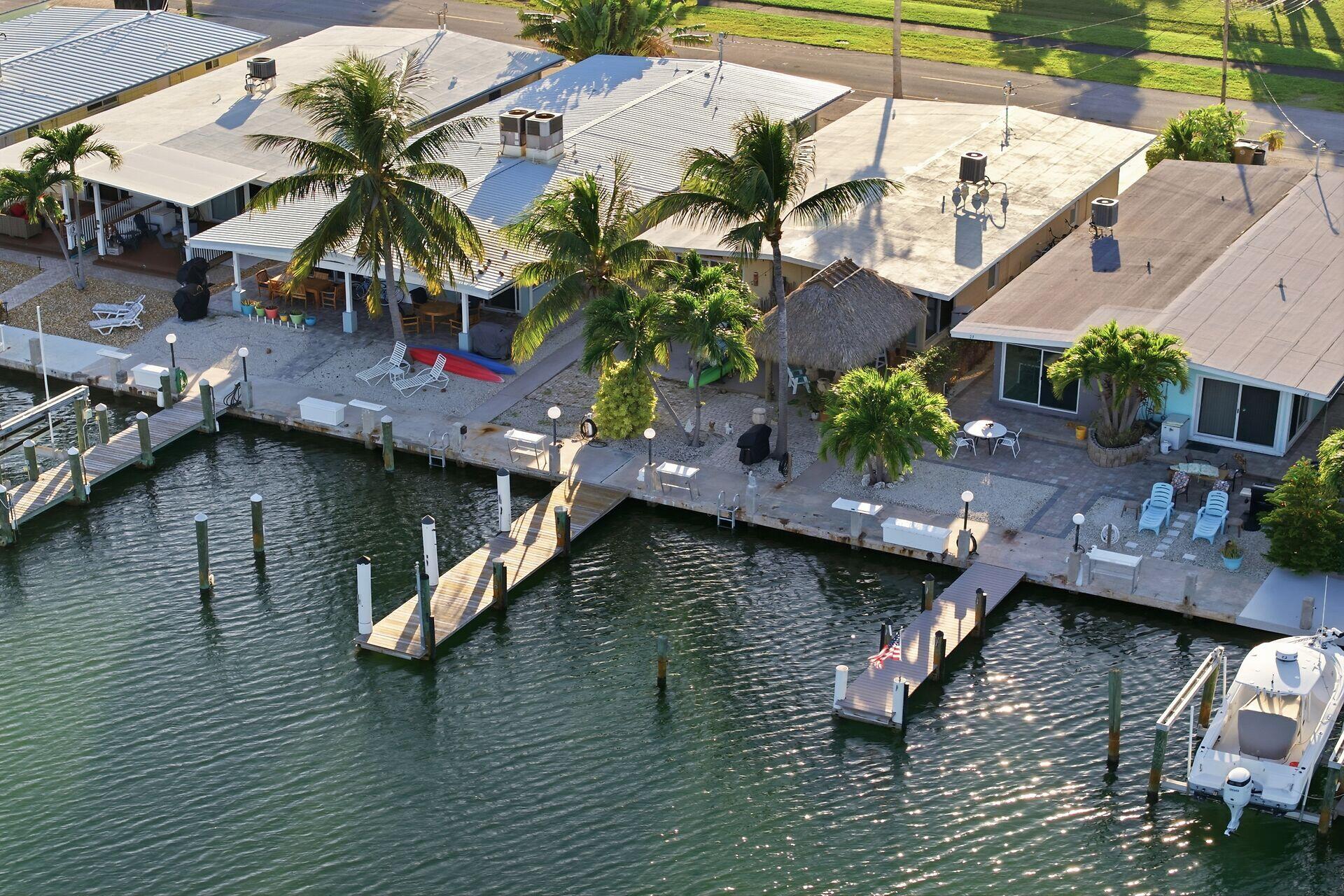 26 7th Street Key Colony Beach, FL 33051 - Photo 28 of 37 an aerial view of house with yard space swimming pool and outdoor seating