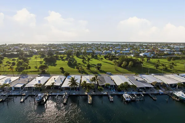 an aerial view of house with yard