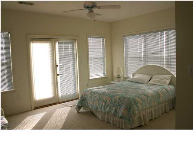 4952 Hwy C30a Santa Rosa Beach Santa Rosa Beach, FL 32459 - Photo 12 of 12 a bedroom with a bed and a window
