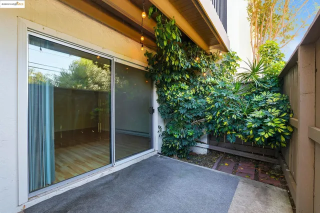 a backyard of a house with seating space