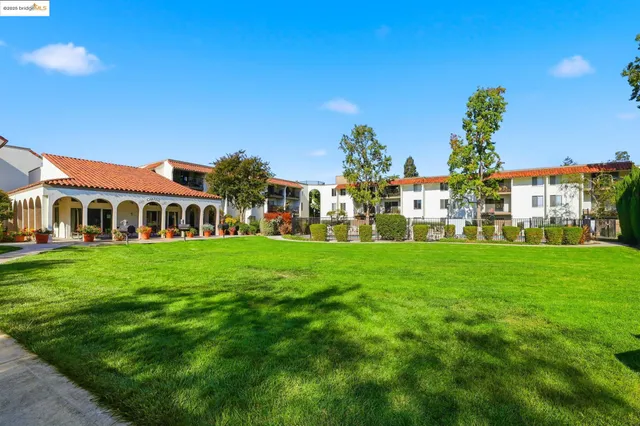 a view of a house with garden and porch