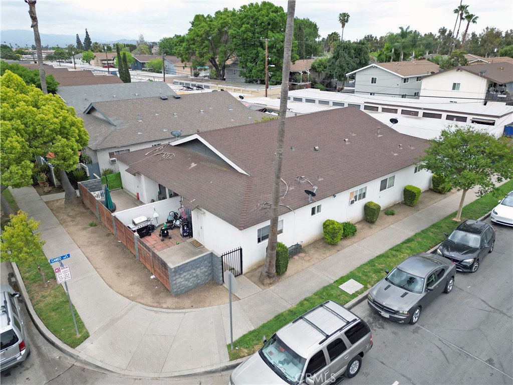 an aerial view of a house with a garden