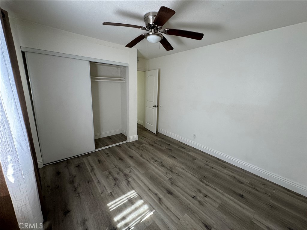 3100 Garnet Lane Fullerton, CA 92831 - Photo 13 of 14 a view of empty room with wooden floor