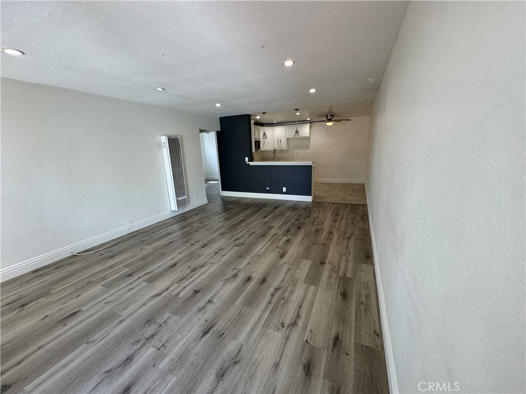 3100 Garnet Lane Fullerton, CA 92831 - Photo 9 of 14 a view of empty room with wooden floor