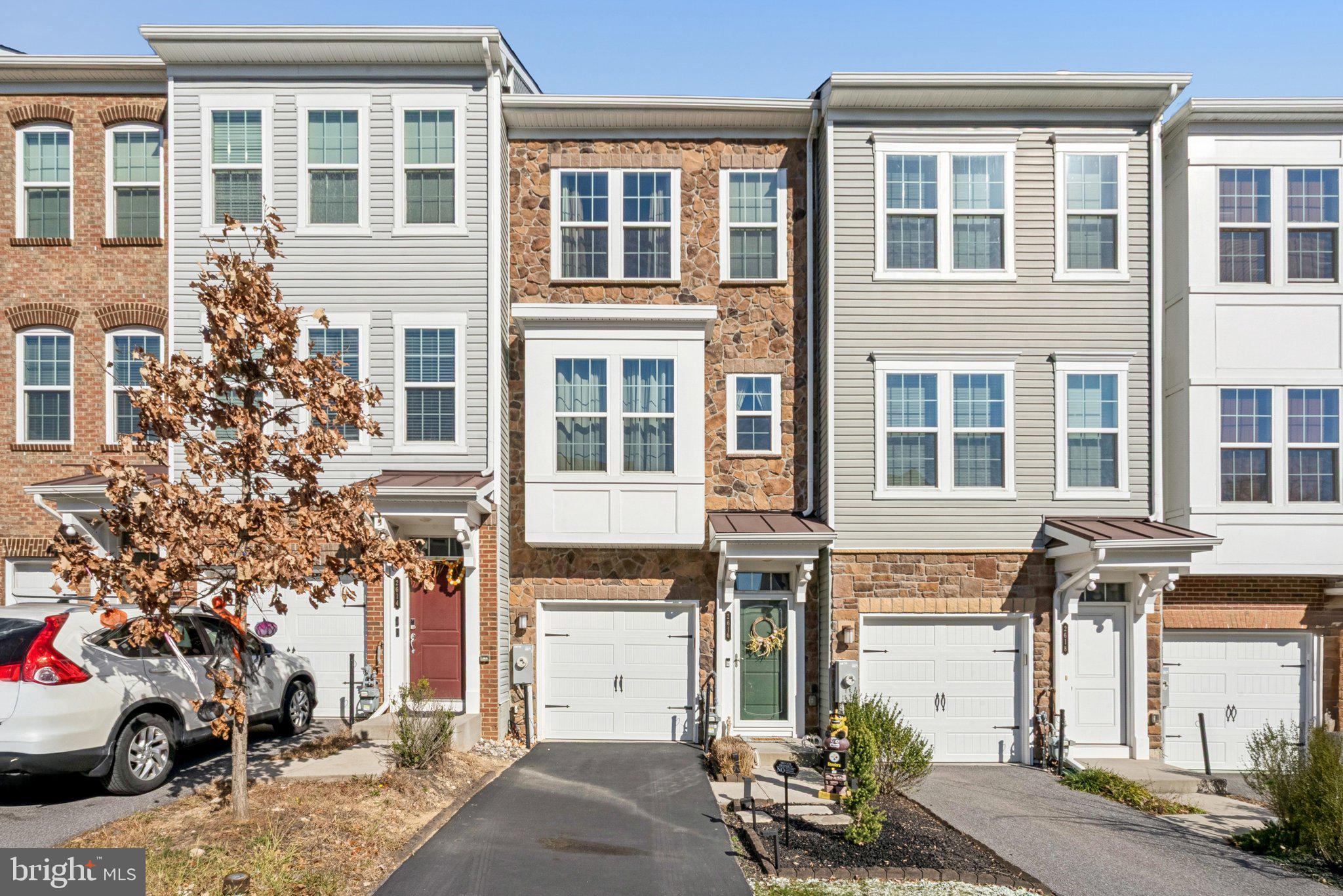 2616 Hardaway Circle Hanover, MD 21076 - Photo 1 of 21 a front view of a building with a street
