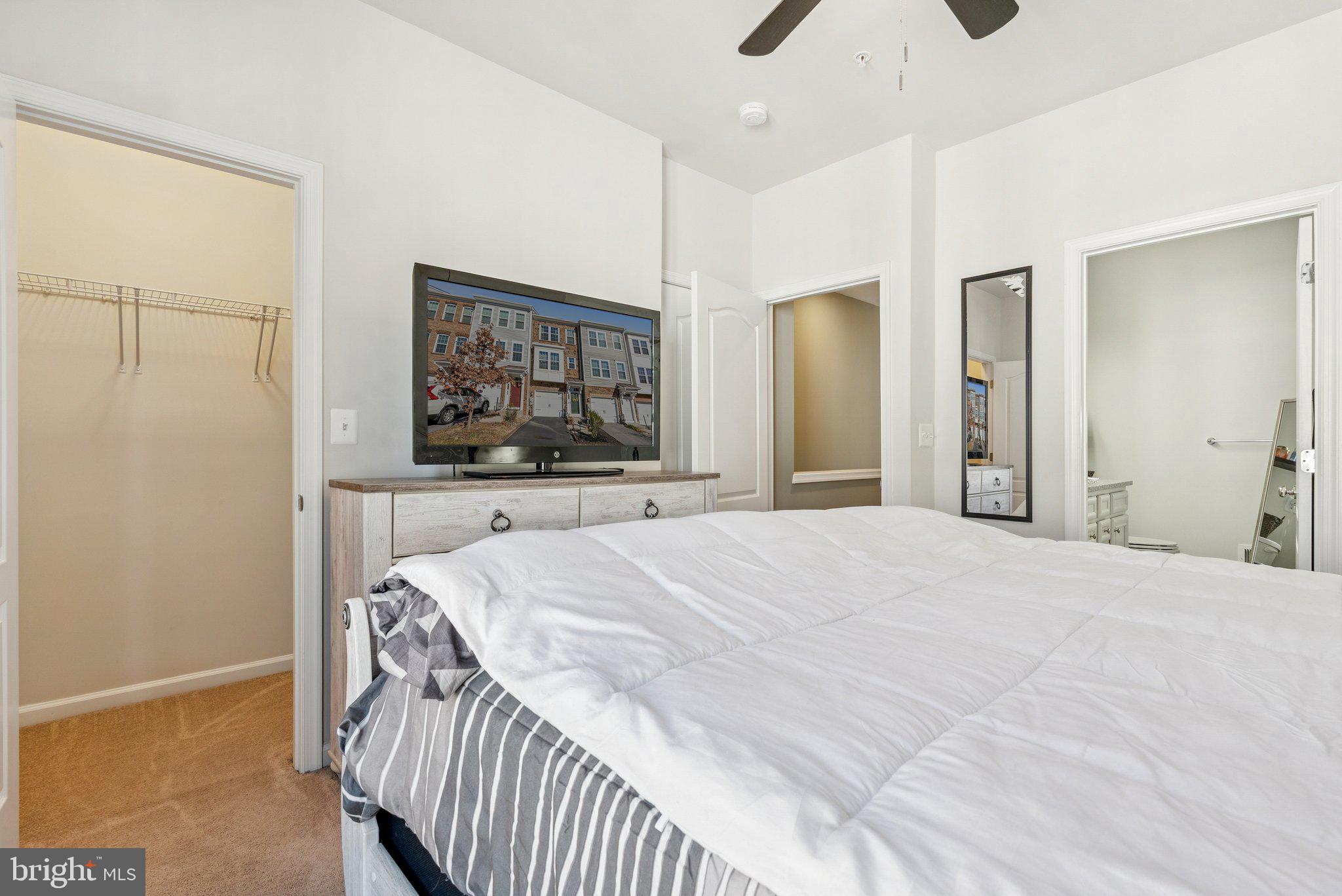 2616 Hardaway Circle Hanover, MD 21076 - Photo 15 of 21 a bedroom with a bed and a large mirror on the dresser