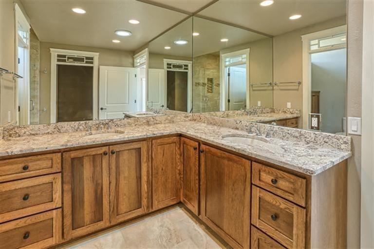 4366 Sams Valley Road Gold Hill, OR 97525 - Photo 25 of 33 Counter top to ceiling mirroring creates