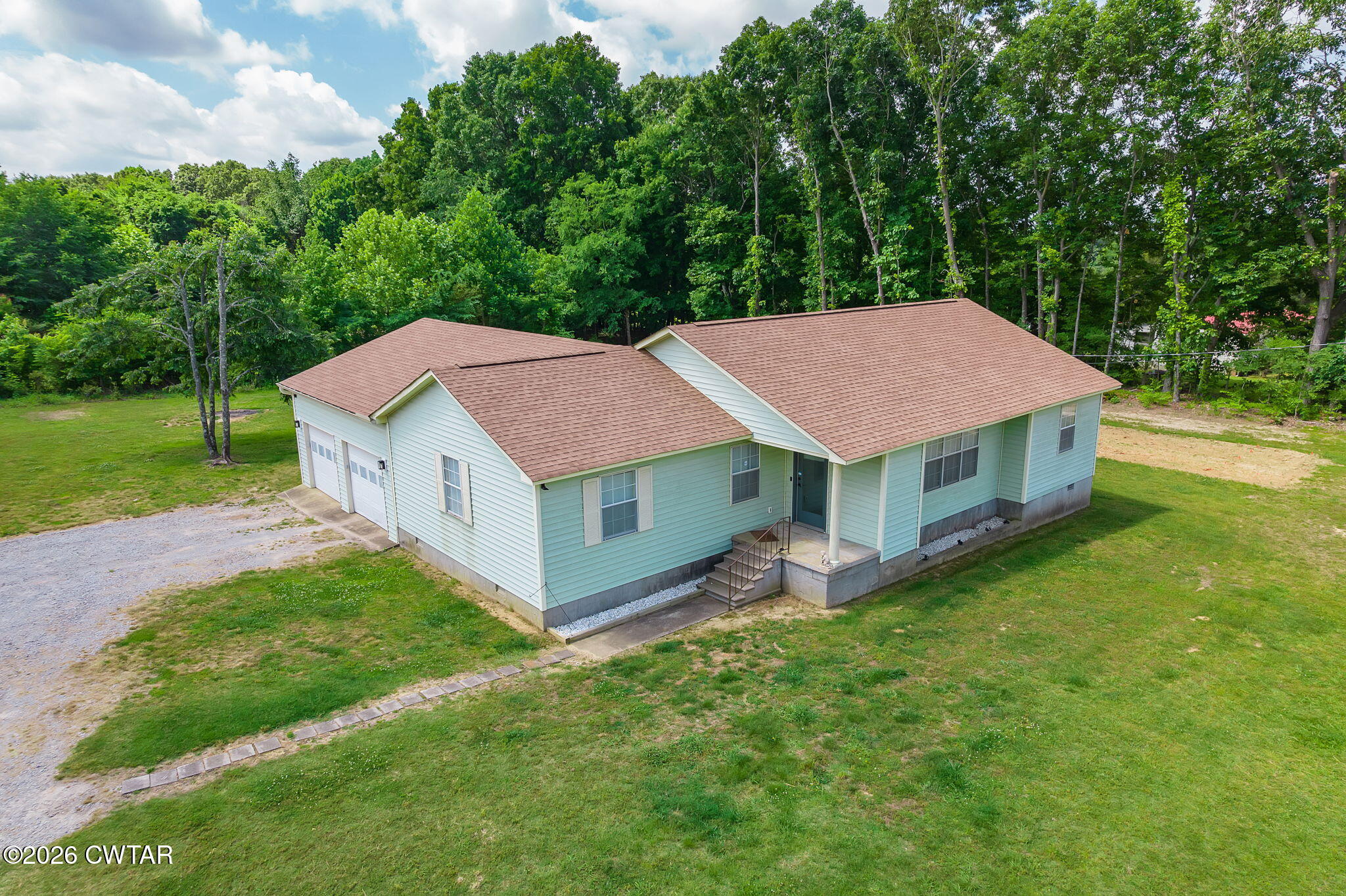 306 Jim Jackson Road Humboldt, TN 38343 - Photo 2 of 29 an aerial view of a house with backyard