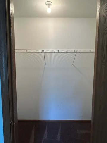 a view of small space with racks on the wall