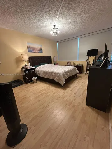 a bathroom with a toilet and shower