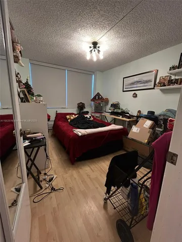 a view of trees from a balcony