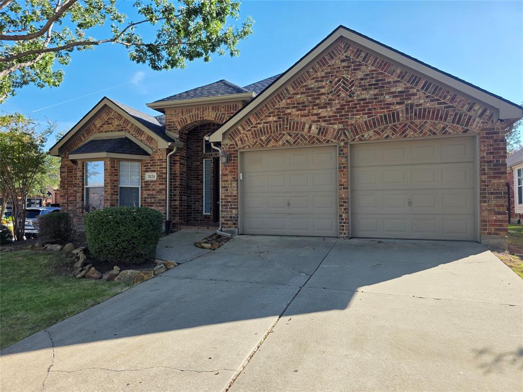3124 Nighthawk Lane Little Elm, TX 75068 - Photo 1 of 13 a view of a house with a yard