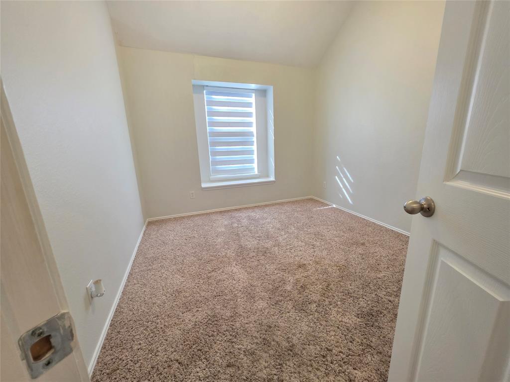 3124 Nighthawk Lane Little Elm, TX 75068 - Photo 7 of 13 a view of room with window and hardwood floor