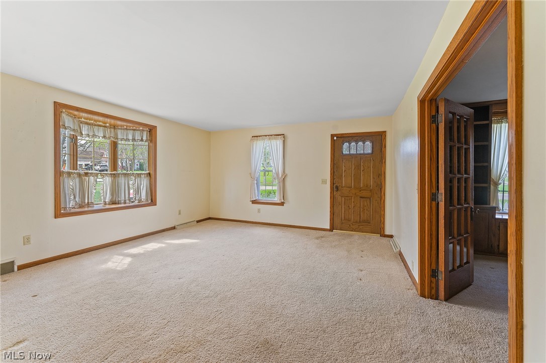 1815 Wick Campbell Road Hubbard, OH 44425 - Photo 21 of 43 Spare room featuring light colored carpet