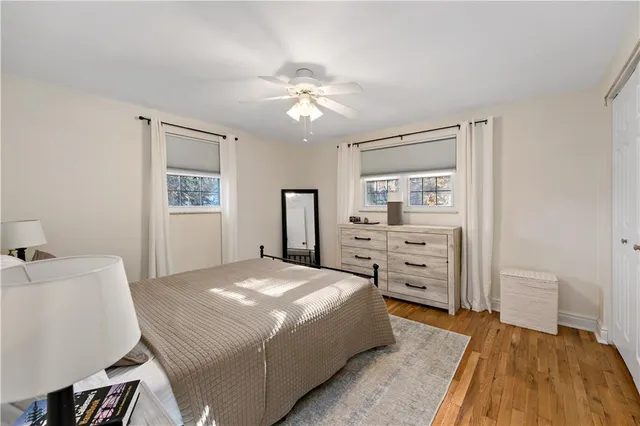 a bedroom with a bed and a table