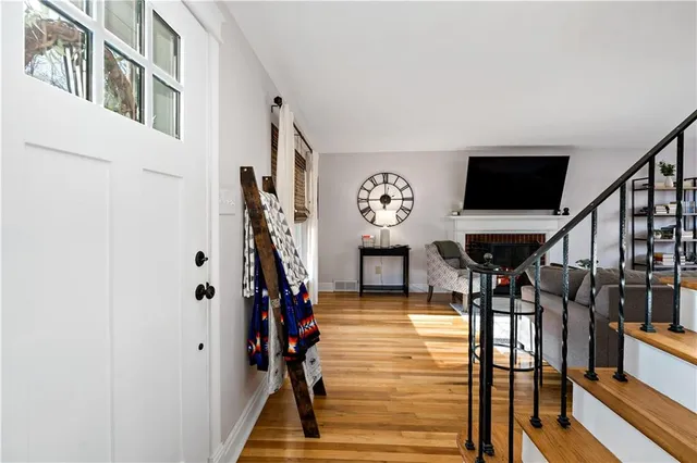 a view of entryway livingroom and hall