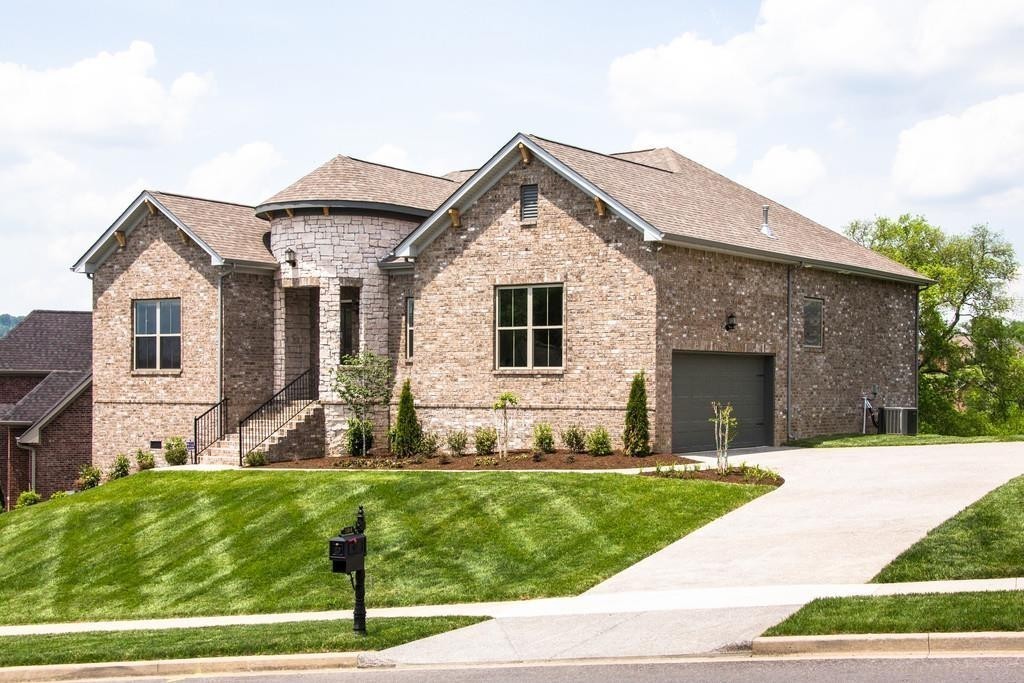 53 Saddle Ridge Mount Mount Juliet, TN 37122 - Photo 2 of 23 a front view of a house with a yard