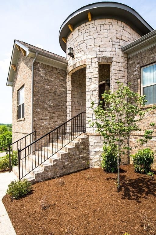 53 Saddle Ridge Mount Mount Juliet, TN 37122 - Photo 4 of 23 a view of building with wooden door