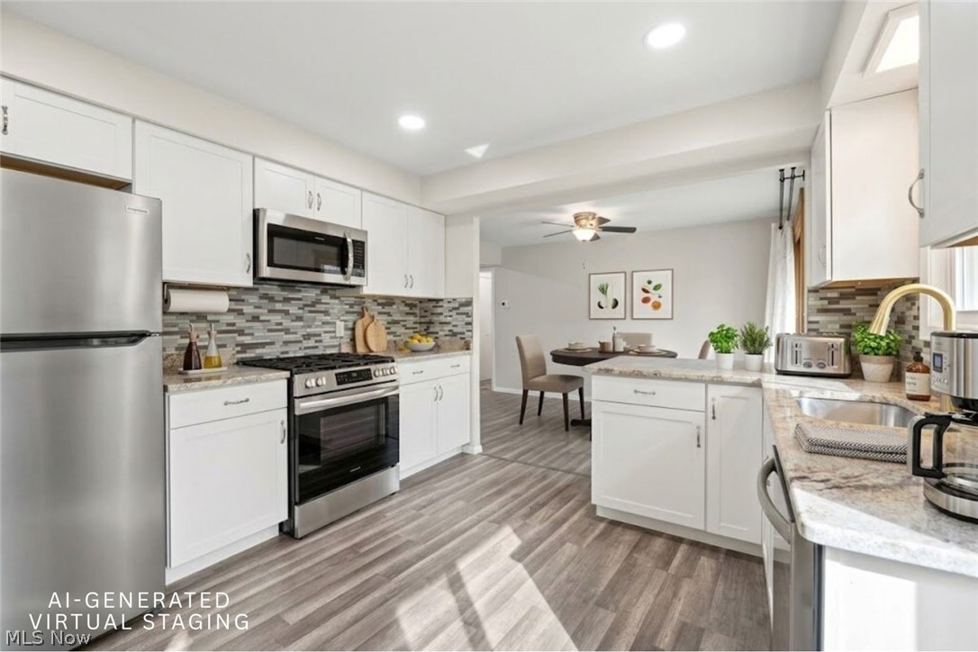 7413 Ward Road Parma, OH 44134 - Photo 10 of 33 AI-generated Virtual Staging of the Kitchen