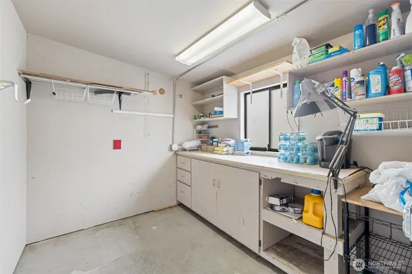 a white refrigerator freezer sitting inside of a kitchen