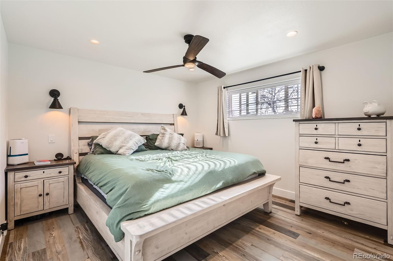 7120 Galapago Street Denver, CO 80221 - Photo 11 of 30 a bedroom with a bed and a window