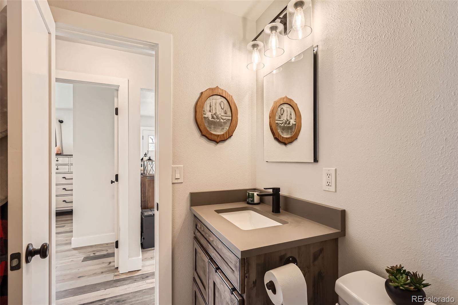 7120 Galapago Street Denver, CO 80221 - Photo 14 of 30 a view of a hallway with elevator