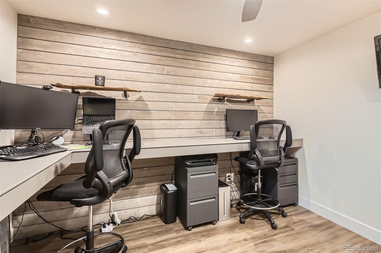 7120 Galapago Street Denver, CO 80221 - Photo 21 of 30 a view of a workspace with furniture and a window