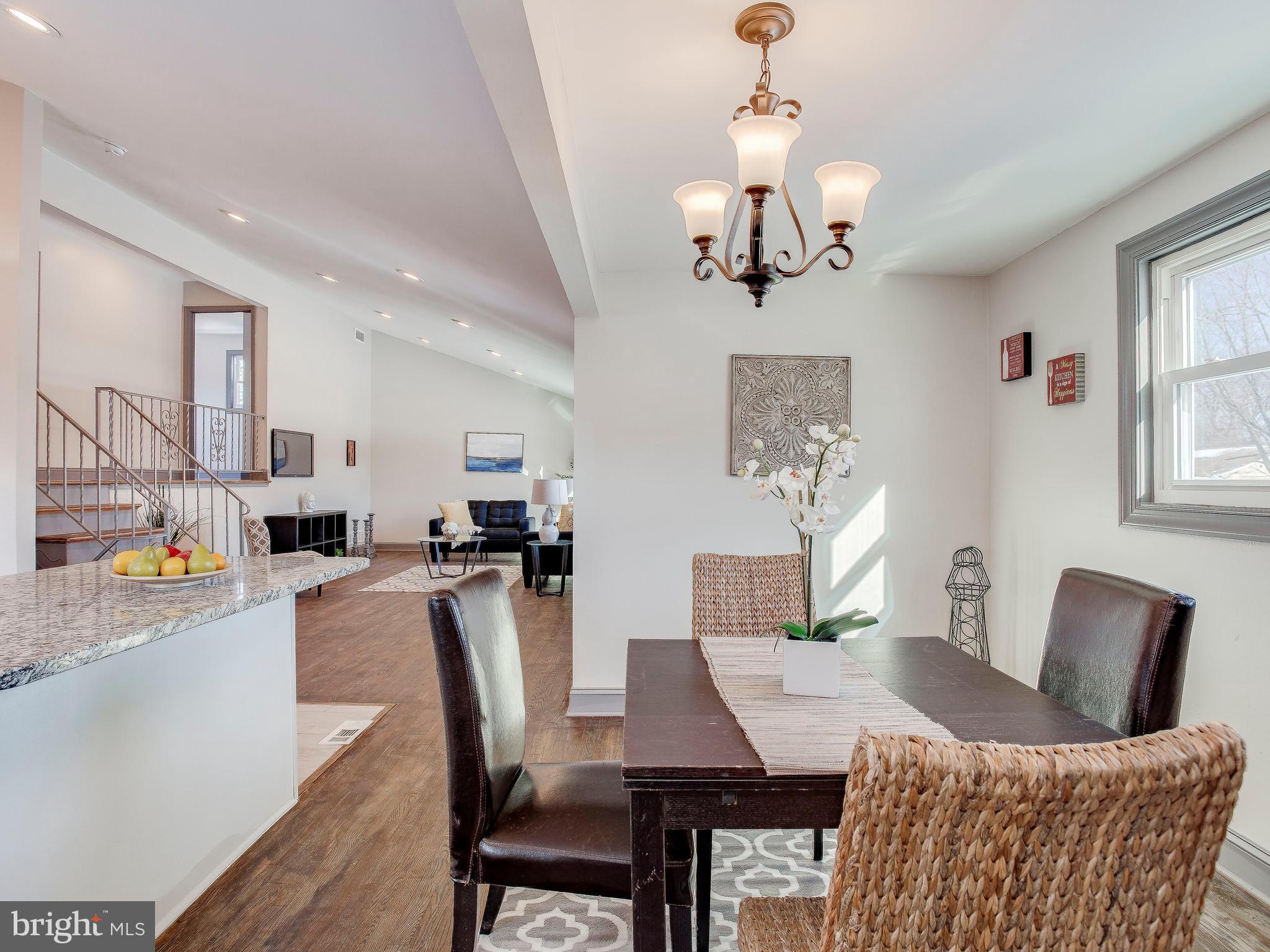 3112 Fairview Road Baltimore, MD 21207 - Photo 8 of 28 a view of a dining room with furniture