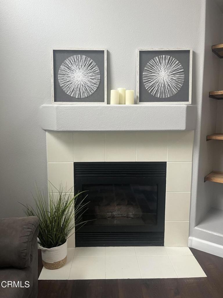 1027 Corte Primavera Oxnard, CA 93030 - Photo 2 of 23 a living room with furniture and a potted plant