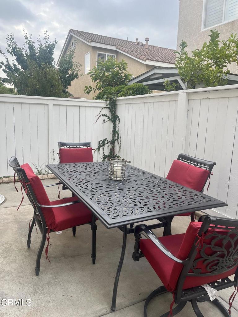 1027 Corte Primavera Oxnard, CA 93030 - Photo 23 of 23 a view of an outdoor sitting area with furniture