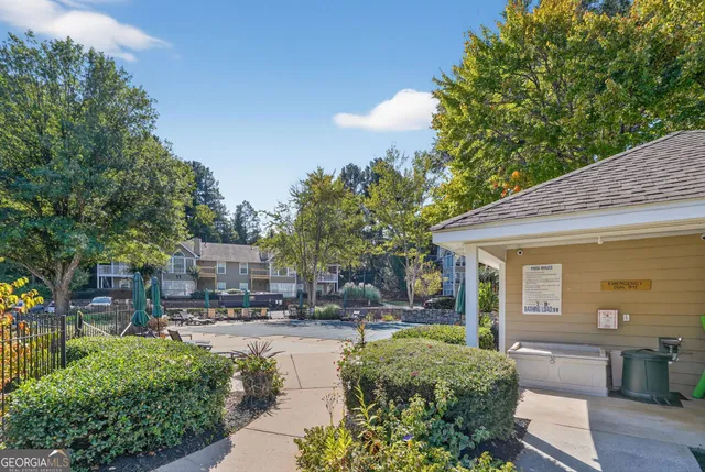 a view of house with outdoor seating and city view
