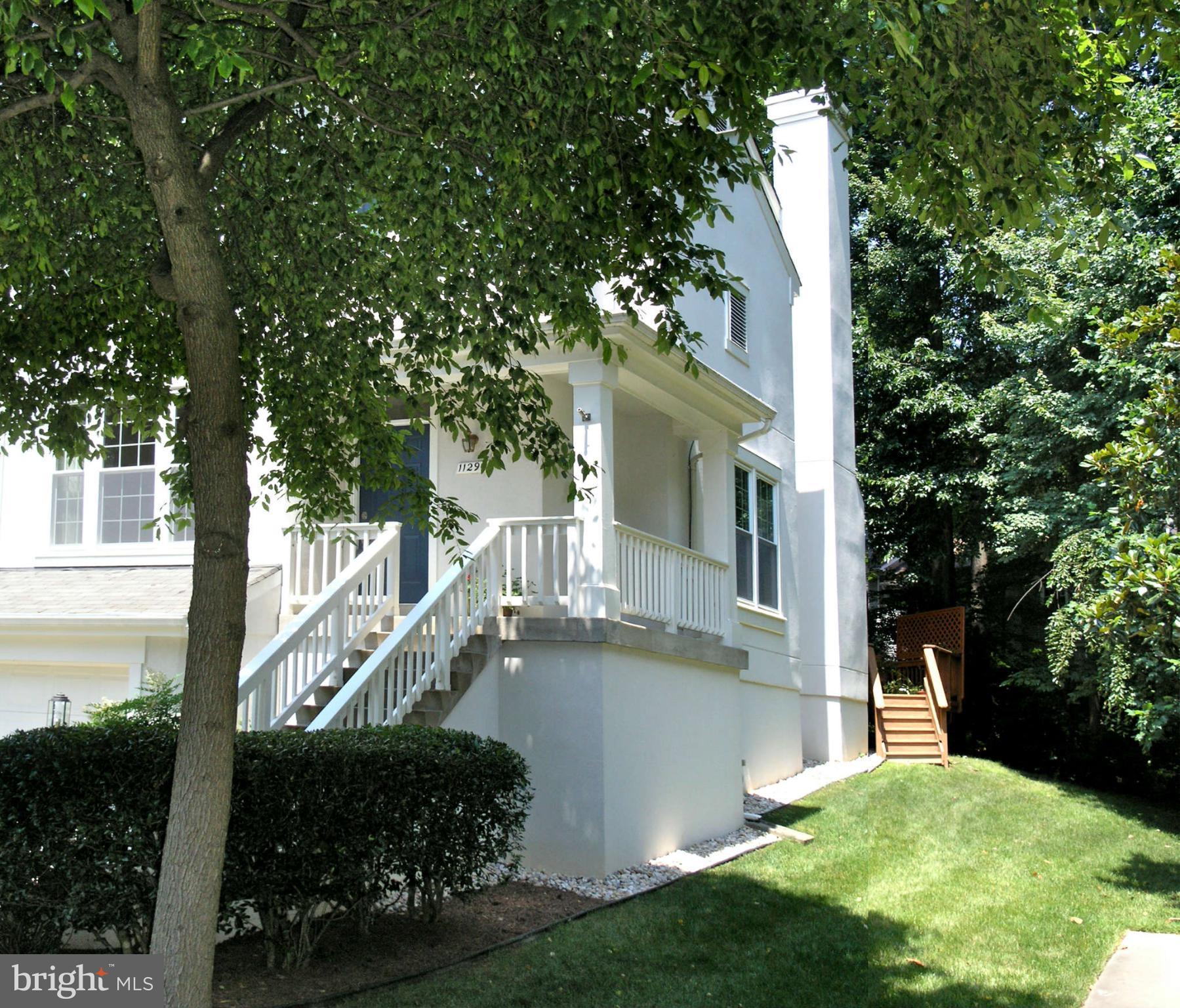 11294 Fairwind Way Reston, VA 20190 - Photo 3 of 30 a view of a house with a small yard