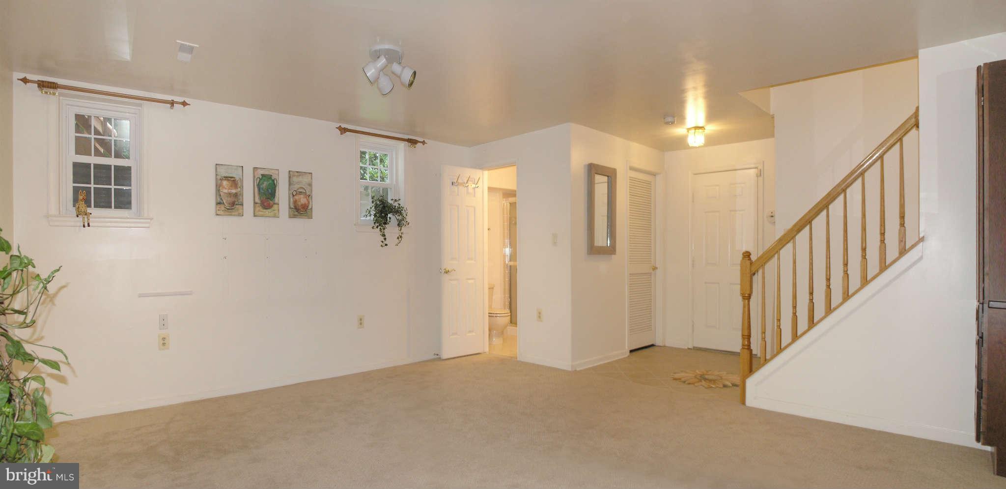 11294 Fairwind Way Reston, VA 20190 - Photo 27 of 30 a view of a hallway with wooden floor and entryway