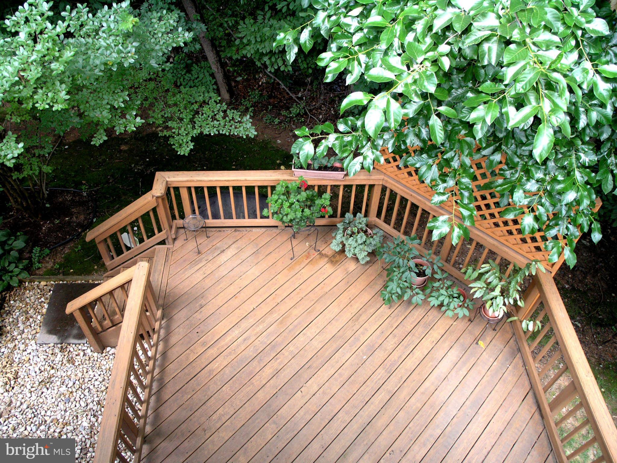 11294 Fairwind Way Reston, VA 20190 - Photo 7 of 30 a view of balcony with wooden floor and fence